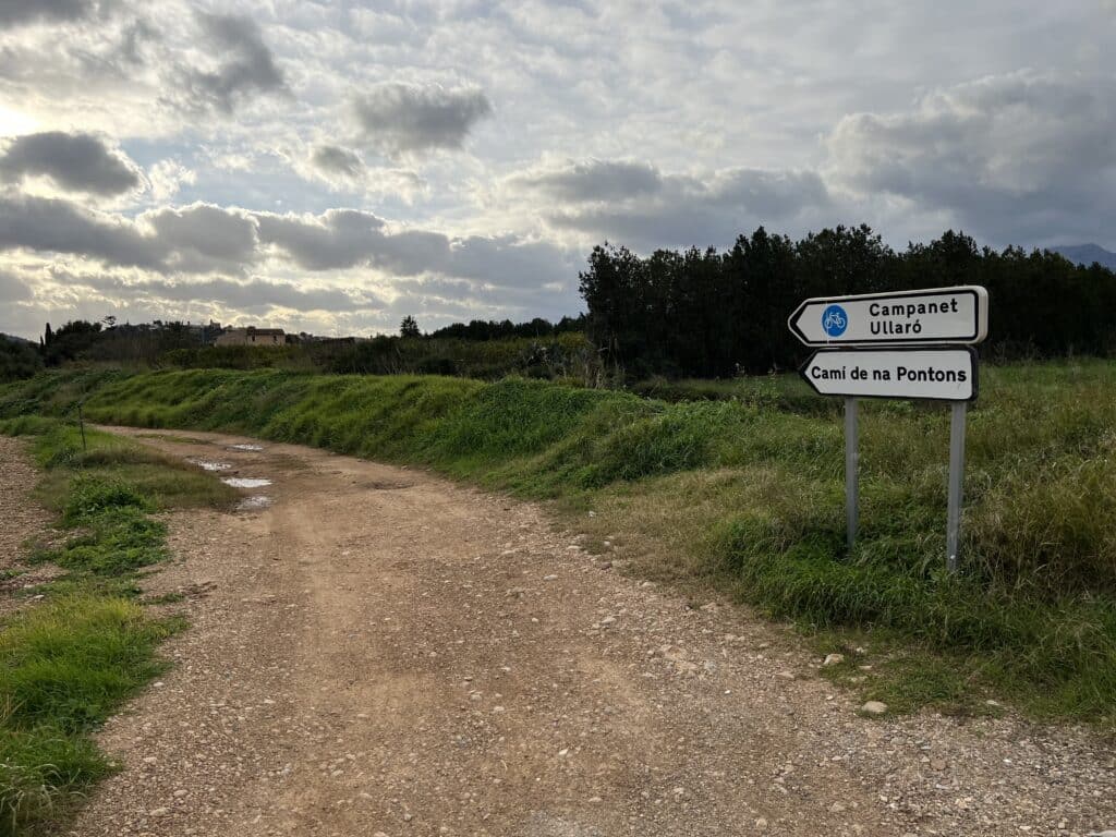 Signs on gravel road near Campenet, Mallorca